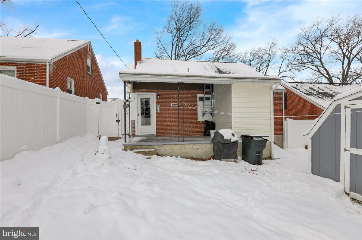 135 Chestnut Street Shillington, PA 19607 - Photo 29 of 34 a view of a house with a snow in the yard