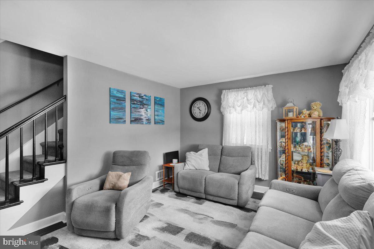 135 Chestnut Street Shillington, PA 19607 - Photo 6 of 34 a living room with furniture and a large window