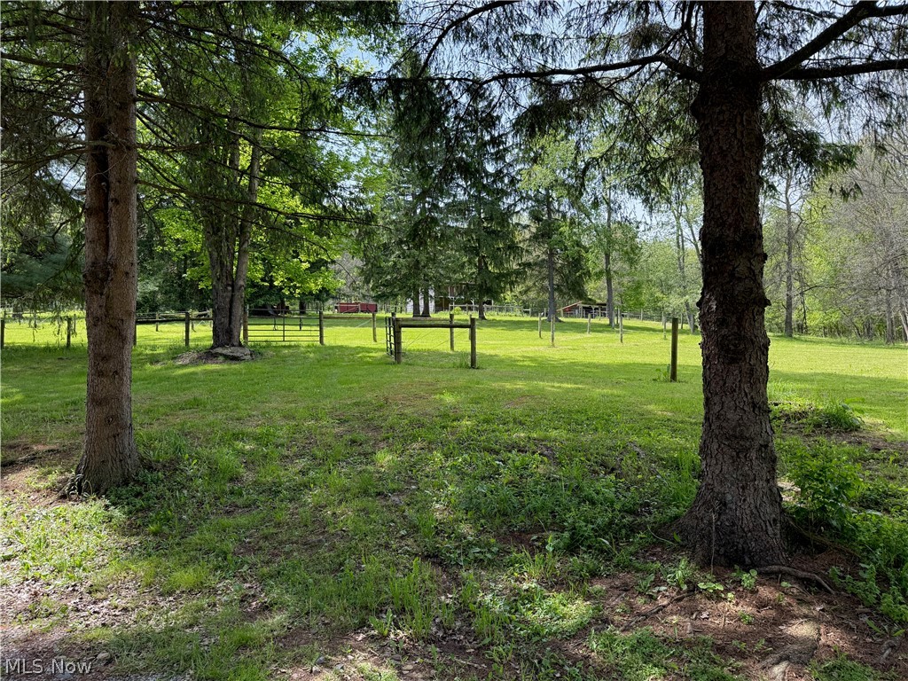 11811 Gaston Road Rogers, OH 44455 - Photo 14 of 38 You've got several acres of usable space, pole barns, and a Quonset Hut (currently used for recreation). Take advantage of the room to play, and play!!
