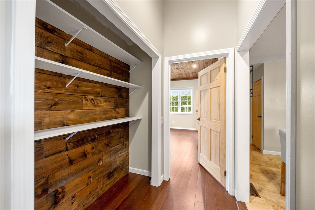 46 Wing Lane Acushnet, MA 02743 - Photo 13 of 38 a view of an entryway with wooden floor