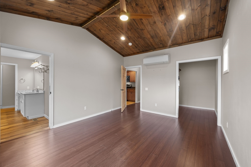 46 Wing Lane Acushnet, MA 02743 - Photo 16 of 38 a view of an empty room with wooden floor