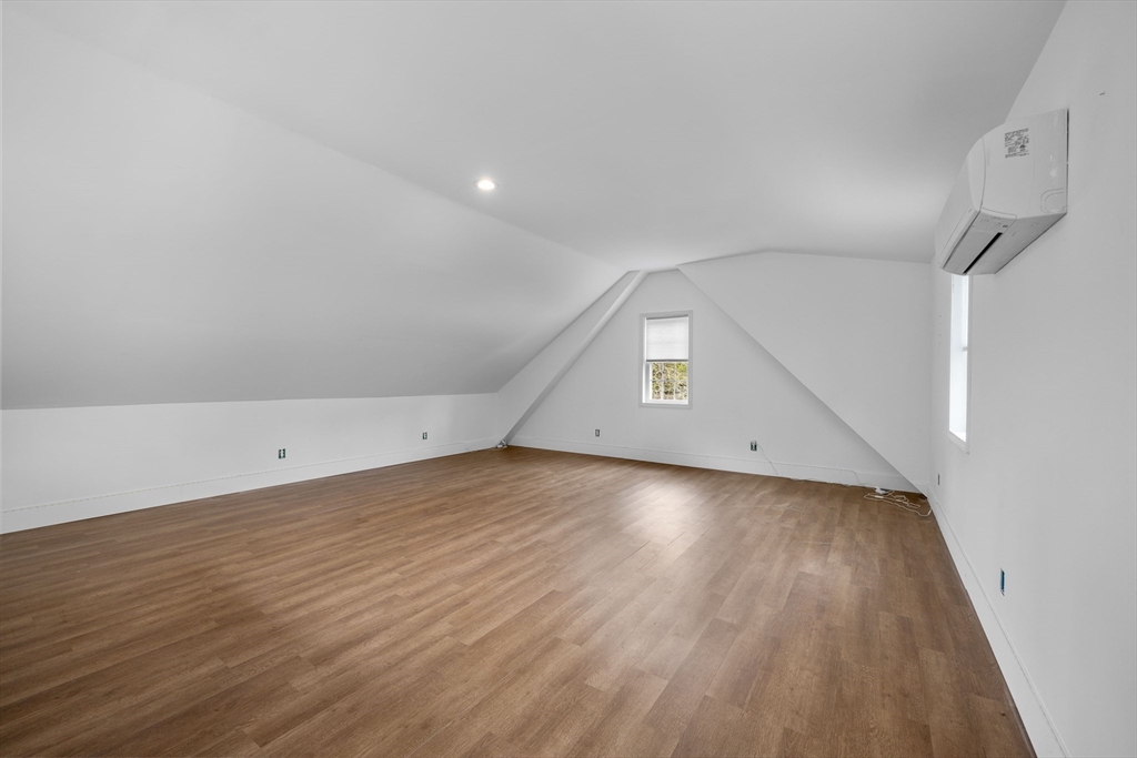 46 Wing Lane Acushnet, MA 02743 - Photo 28 of 38 an empty room with wooden floor and windows