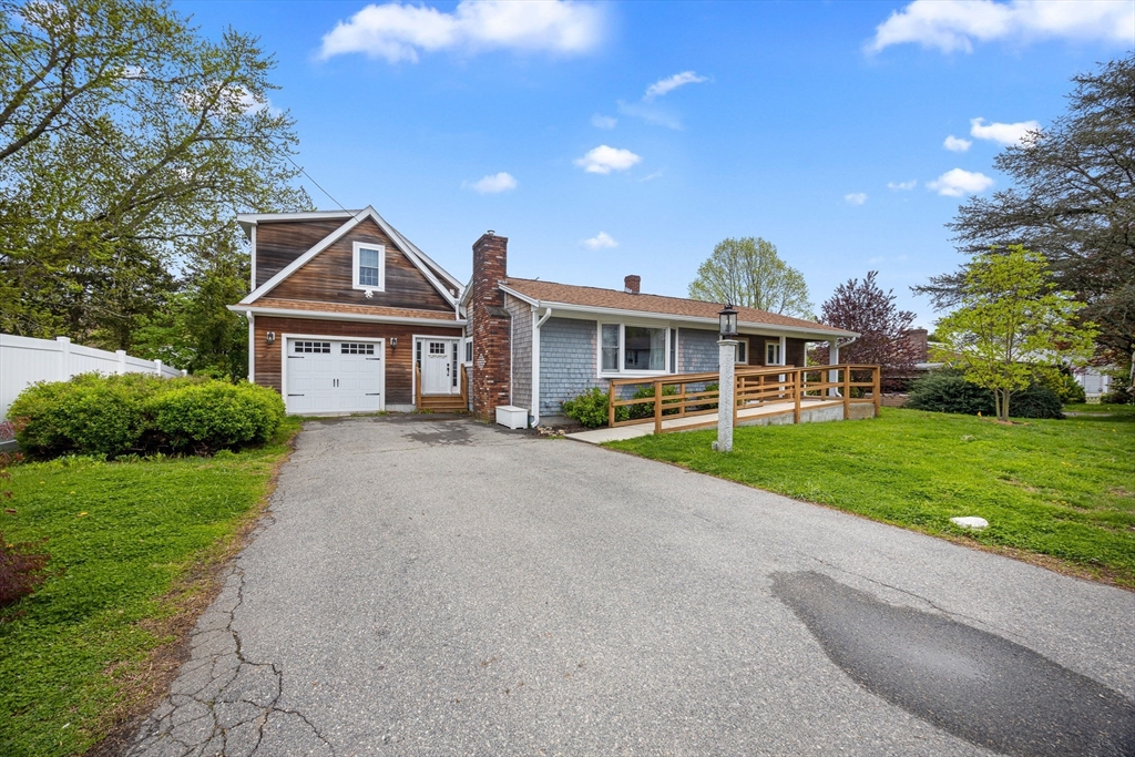46 Wing Lane Acushnet, MA 02743 - Photo 4 of 38 a front view of a house with a yard