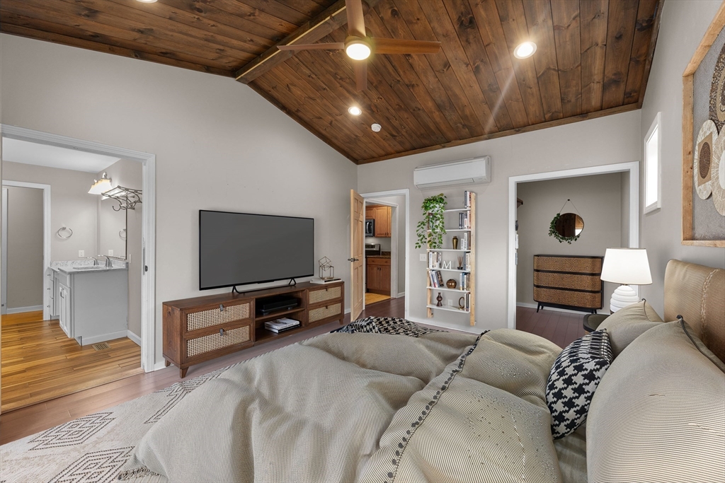 46 Wing Lane Acushnet, MA 02743 - Photo 5 of 38 a living room with furniture and a flat screen tv