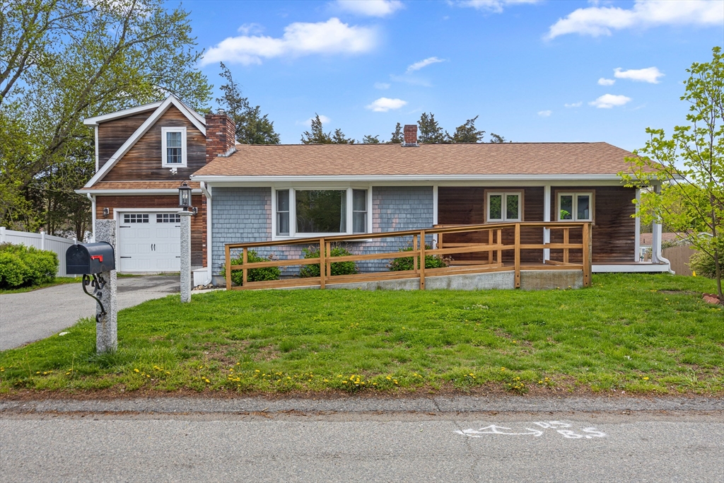 46 Wing Lane Acushnet, MA 02743 - Photo 6 of 38 front view of a house with a yard