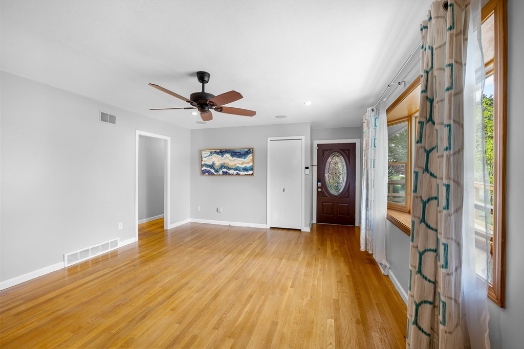 46 Wing Lane Acushnet, MA 02743 - Photo 8 of 38 a view of an entryway with wooden floor