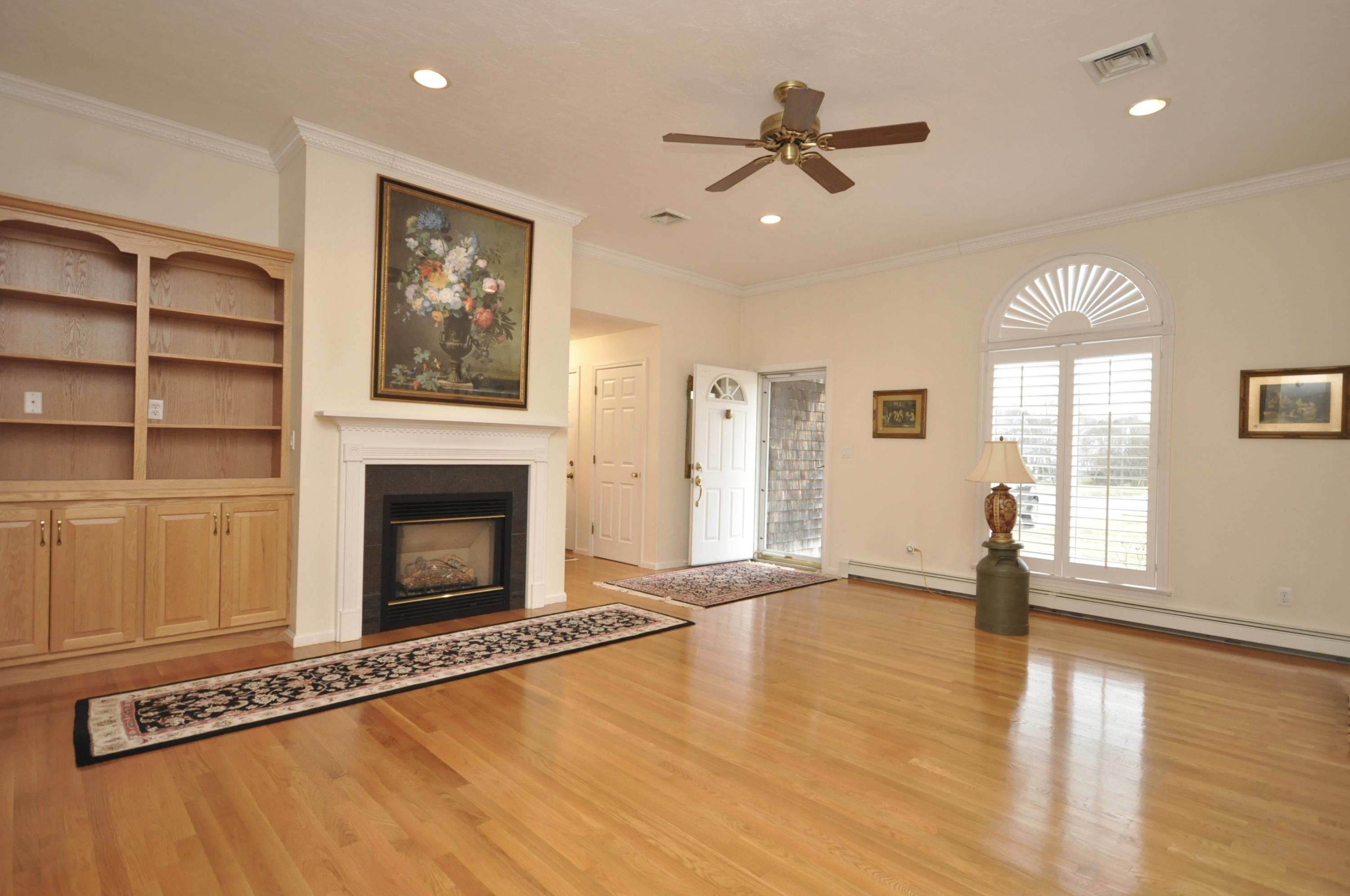 4 Oakbluff Road Sagamore Beach, MA 02562 - Photo 11 of 35 a view of an empty room with a window and fireplace