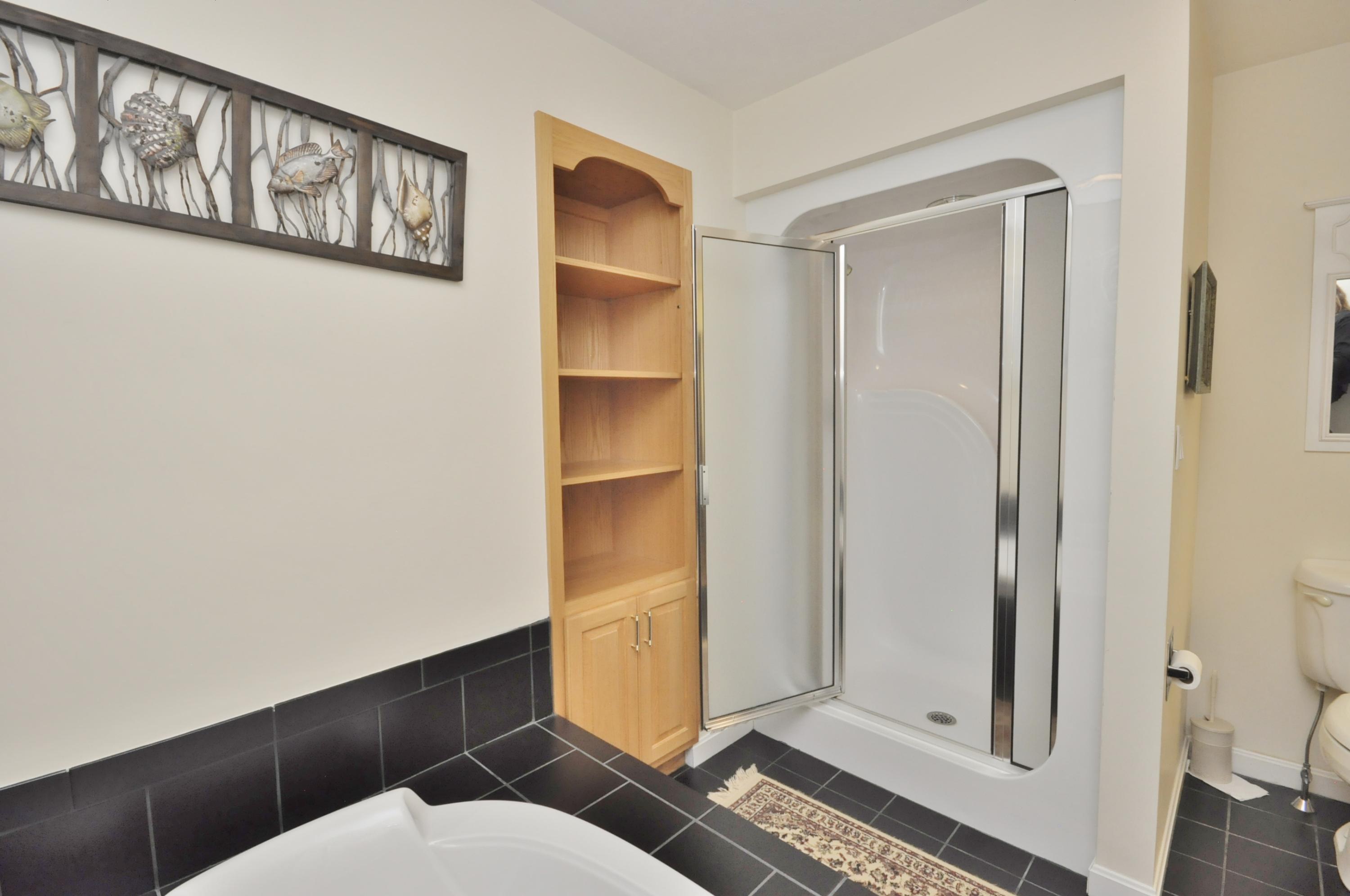 4 Oakbluff Road Sagamore Beach, MA 02562 - Photo 21 of 35 a bathroom with a toilet and a shower