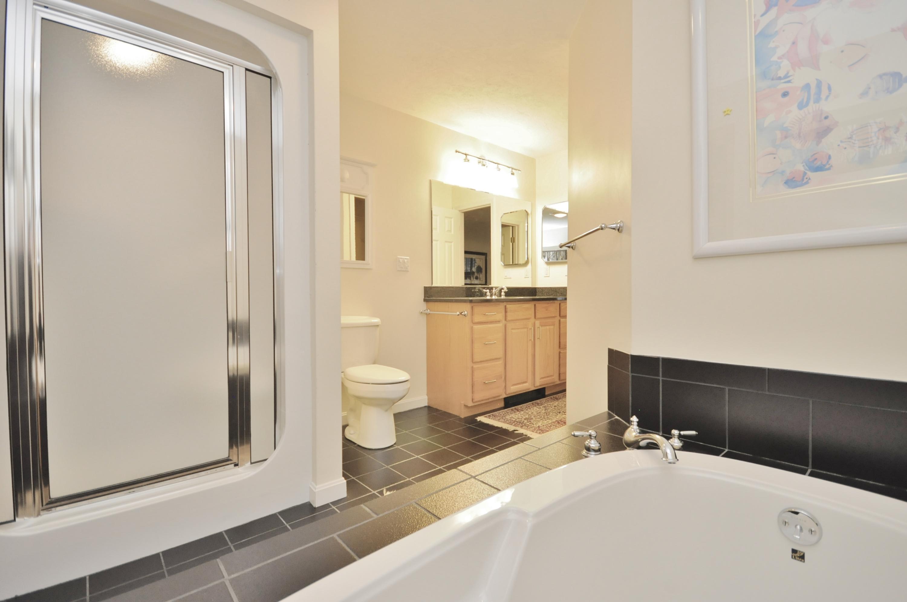 4 Oakbluff Road Sagamore Beach, MA 02562 - Photo 22 of 35 a bathroom with a sink a toilet and shower