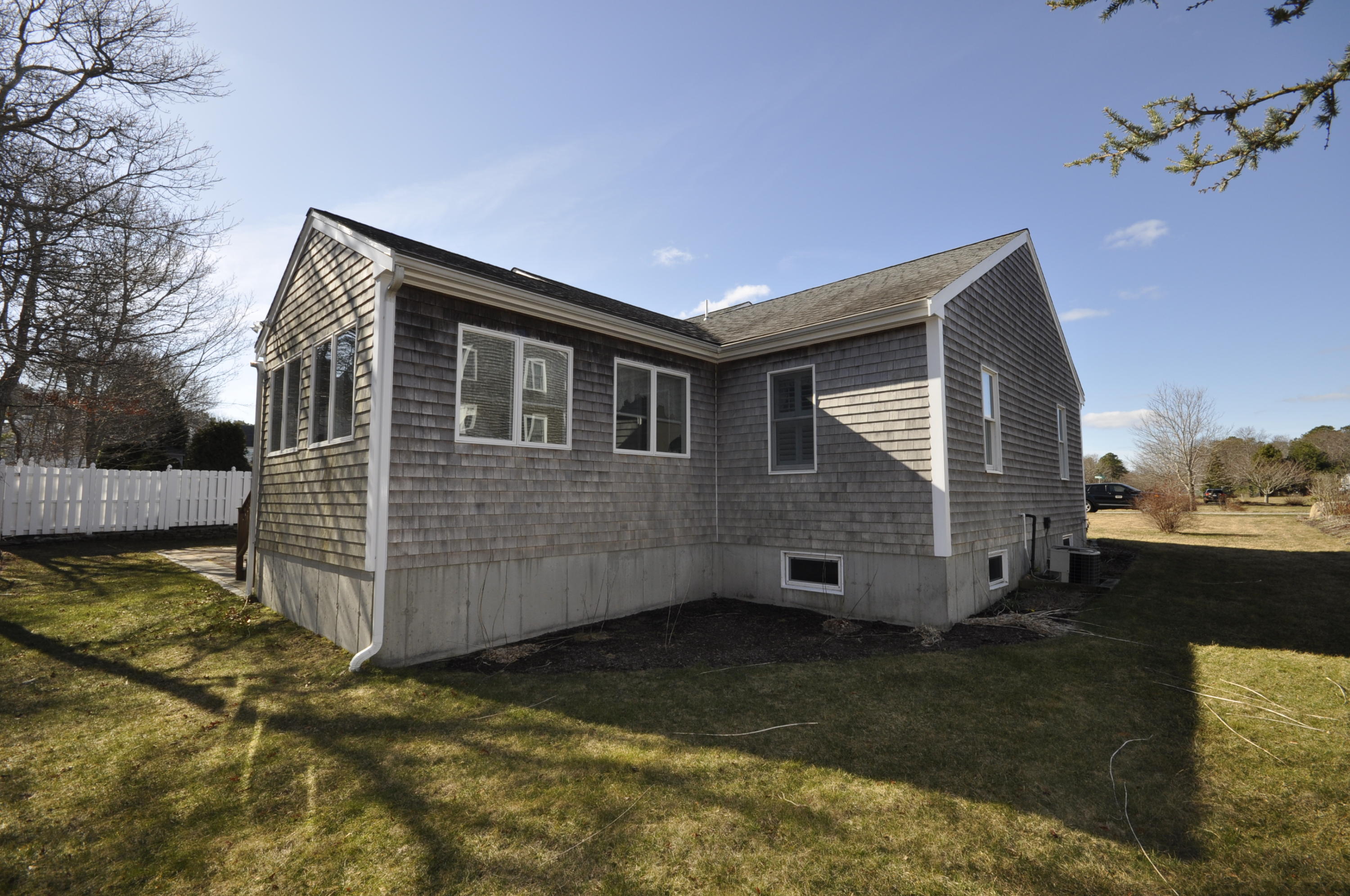 4 Oakbluff Road Sagamore Beach, MA 02562 - Photo 29 of 35 a view of a house with a yard