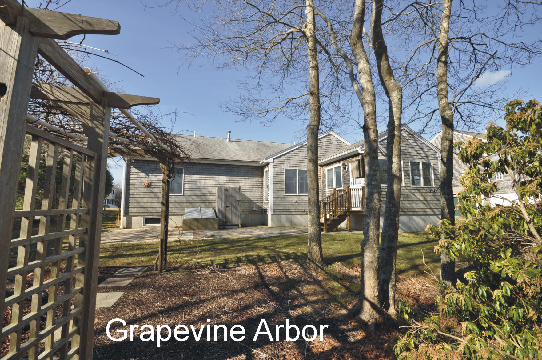 4 Oakbluff Road Sagamore Beach, MA 02562 - Photo 3 of 35 a view of a house with a yard