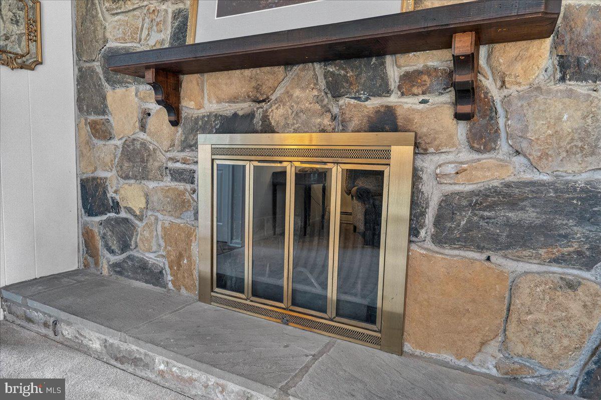 1416 Ponds Edge Road West Chester, PA 19382 - Photo 38 of 47 Fireplace in lower living area