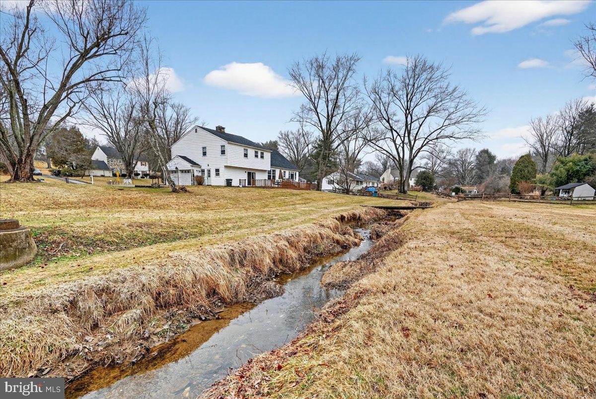 1416 Ponds Edge Road West Chester, PA 19382 - Photo 47 of 47 View of side/rear of home from water feature