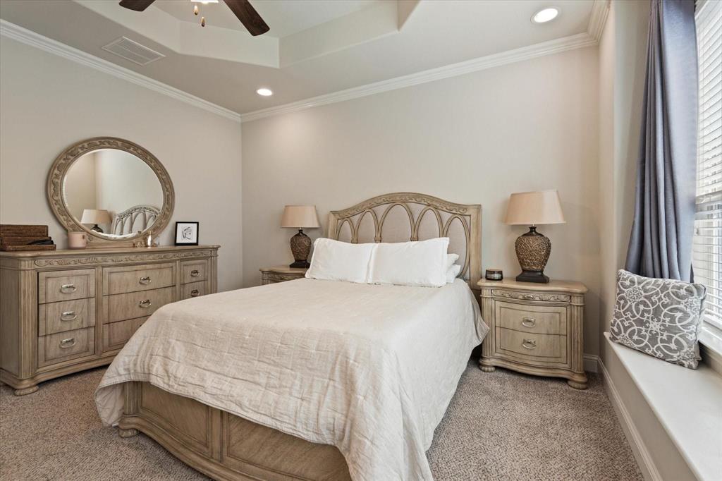 3615 Adriana Avenue Irving, TX 75038 - Photo 17 of 33 a bedroom with a bed and a dresser