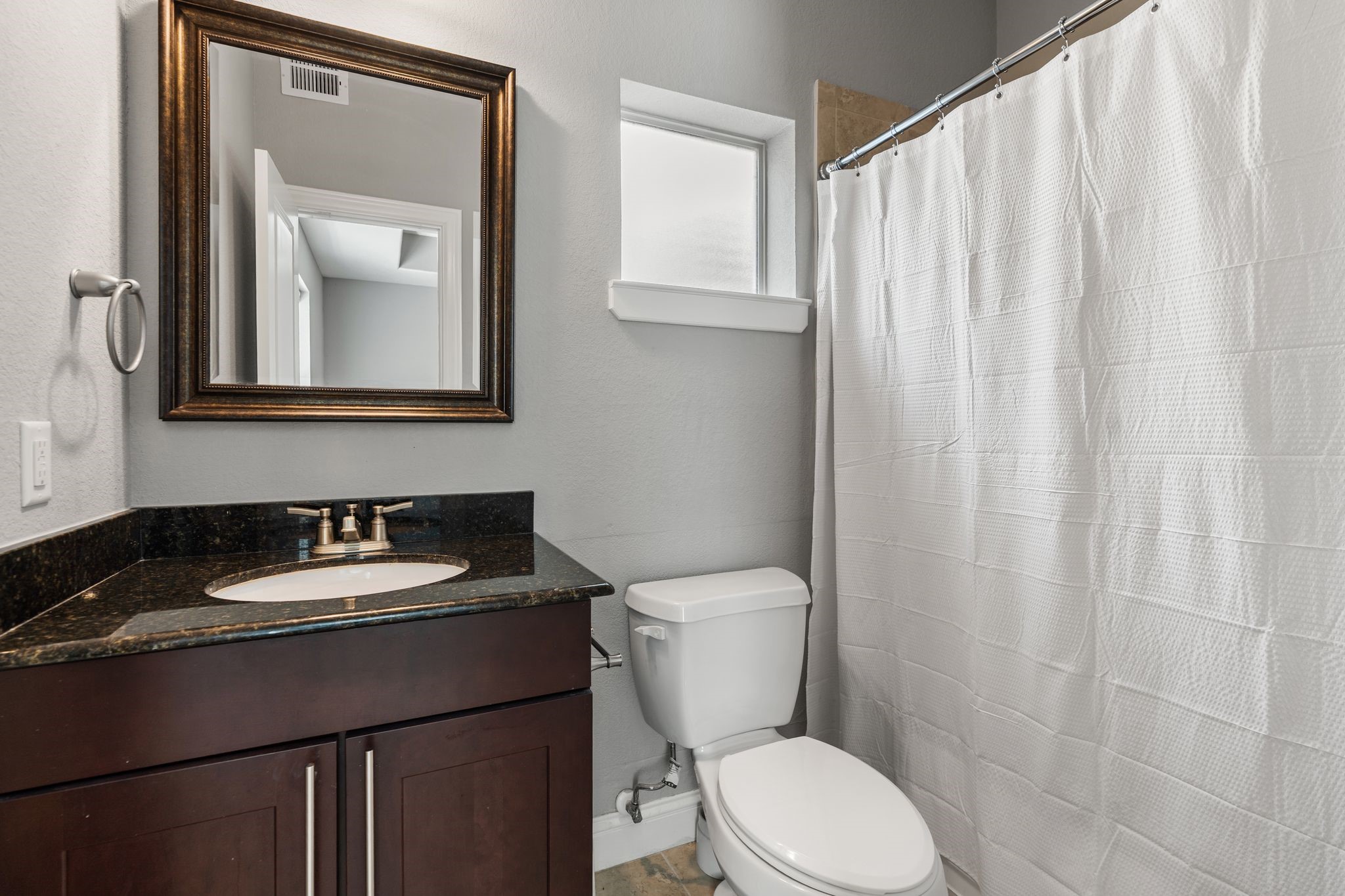 2316 Beall Street Houston, TX 77008 - Photo 15 of 30 1st floor bedroom has it's own ensuite full bathroom- perfect for guests or rental opportunity.