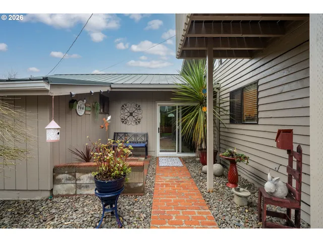 a view of a porch with furniture