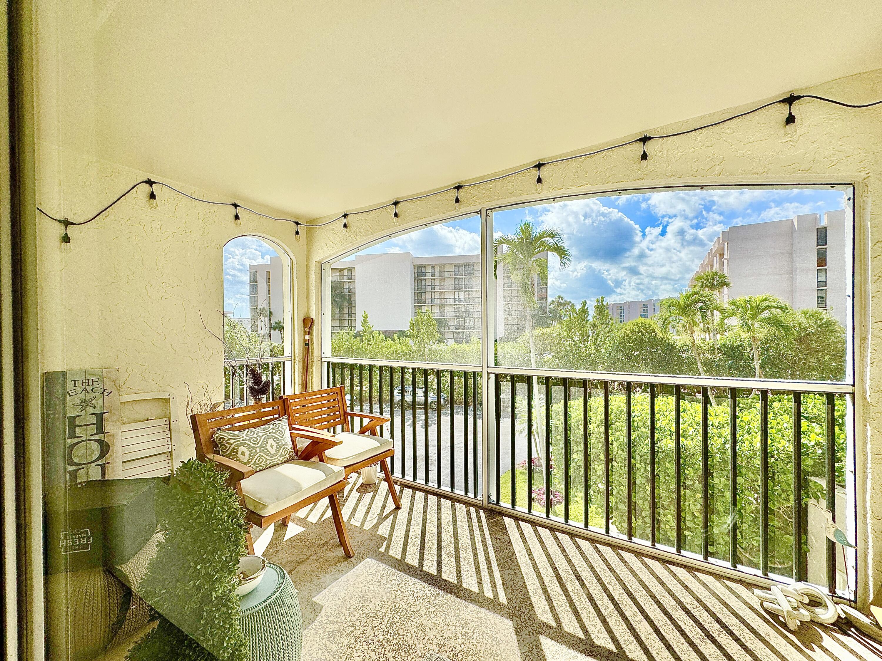 2871 North Ocean Boulevard, Unit R248 Boca Raton, FL 33431 - Photo 5 of 44 a view of a balcony with furniture