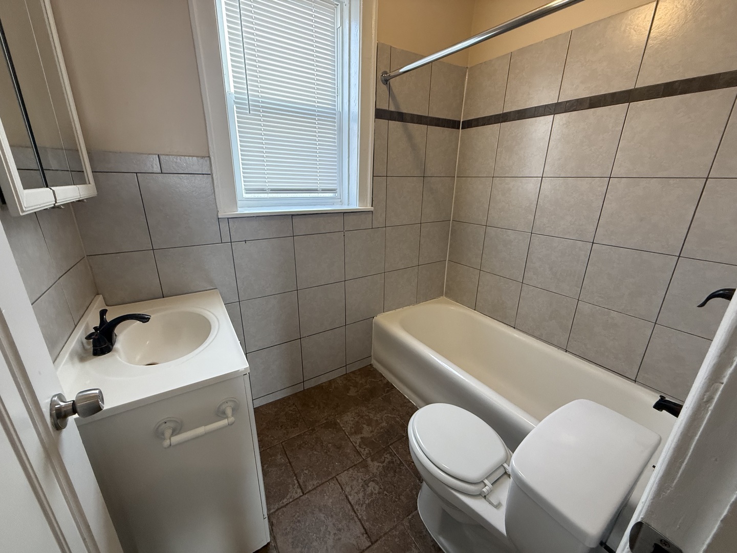 2805 North Kilbourn Avenue, Unit 3S Chicago, IL 60639 - Photo 11 of 13 a bathroom with a sink and toilet
