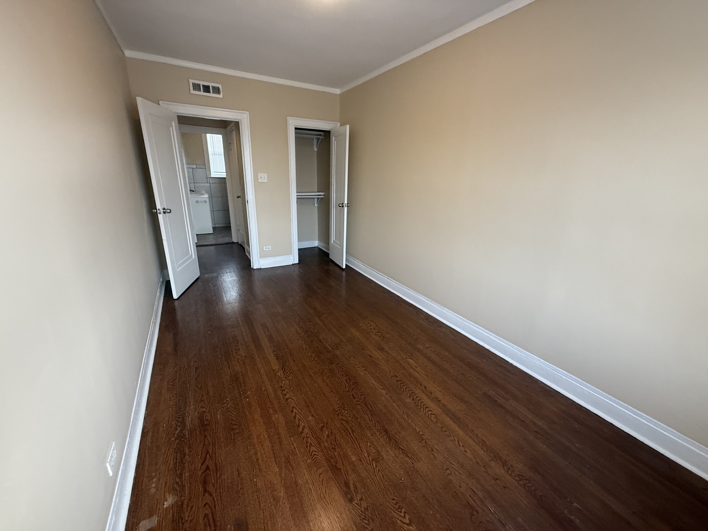2805 North Kilbourn Avenue, Unit 3S Chicago, IL 60639 - Photo 10 of 13 a view of a hallway with wooden floor
