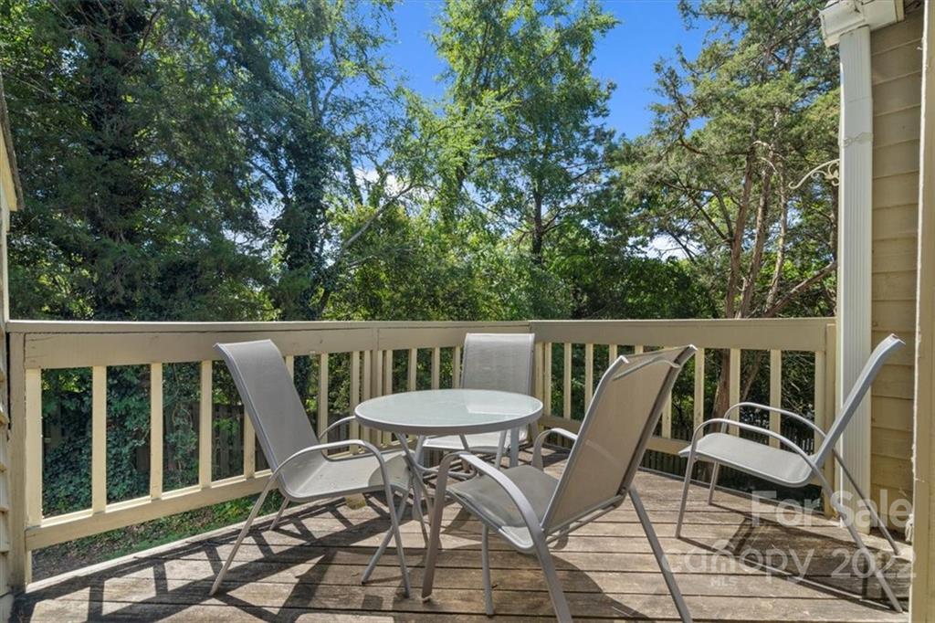 1606 Sharon Road West Charlotte, NC 28210 - Photo 18 of 19 a view of a chair and table on the roof deck