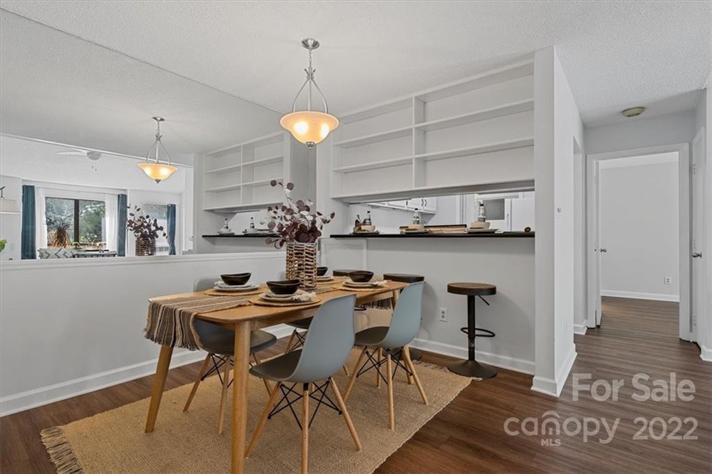 1606 Sharon Road West Charlotte, NC 28210 - Photo 5 of 19 a view of a dining room with furniture