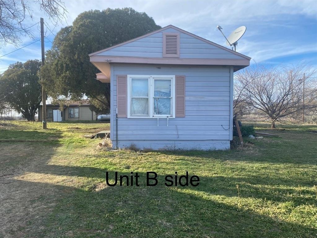 10971 West Lake Road Abilene, TX 79601 - Photo 16 of 17 a view of a house with a yard