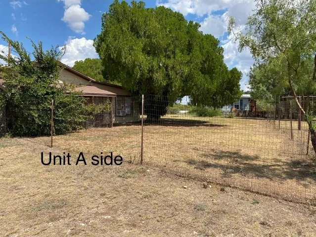 a view of a park with trees