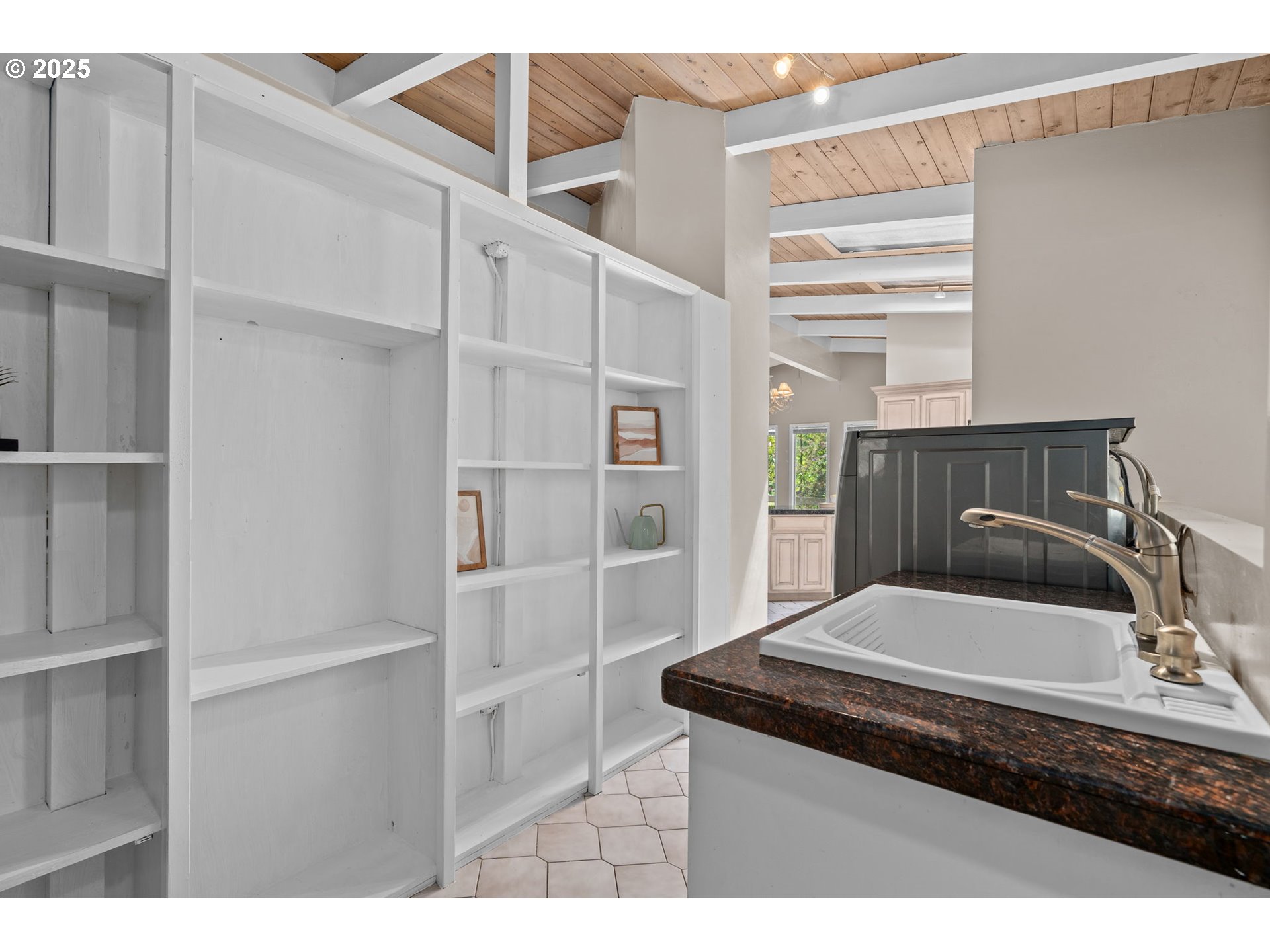 32314 Southeast Oxbow Drive Gresham, OR 97080 - Photo 20 of 40 a kitchen with a refrigerator and a sink