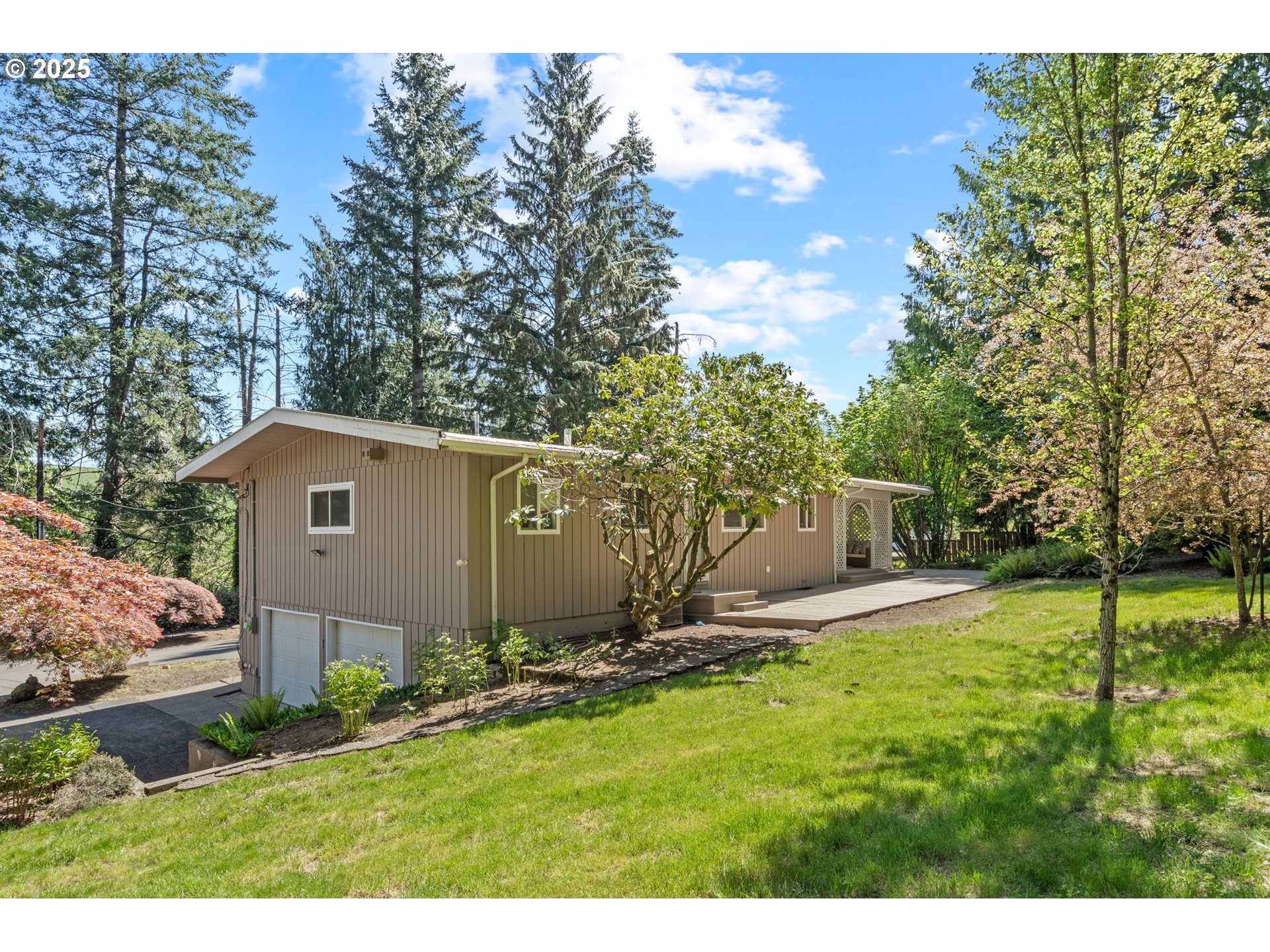 32314 Southeast Oxbow Drive Gresham, OR 97080 - Photo 4 of 40 a house view with a outdoor space
