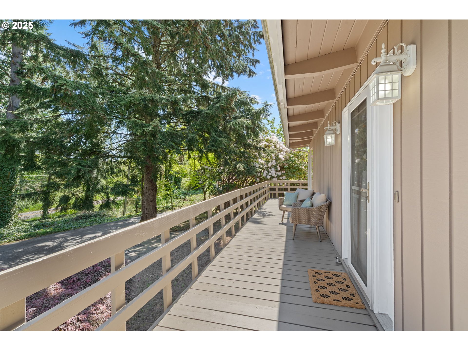 32314 Southeast Oxbow Drive Gresham, OR 97080 - Photo 7 of 40 a view of balcony with wooden floor and bench