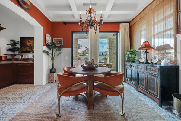 a view of a swimming pool with an outdoor seating