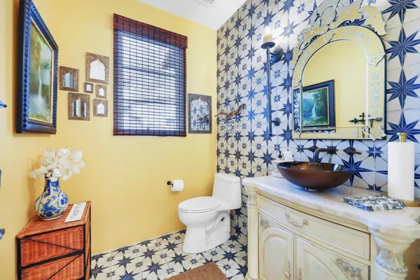 a view of a house with a yard and plants