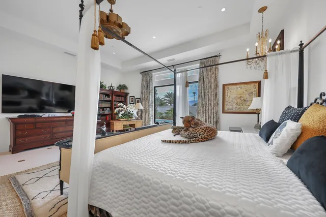 a view of a garden with sitting area