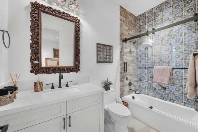 a view of a city with mountains in the background