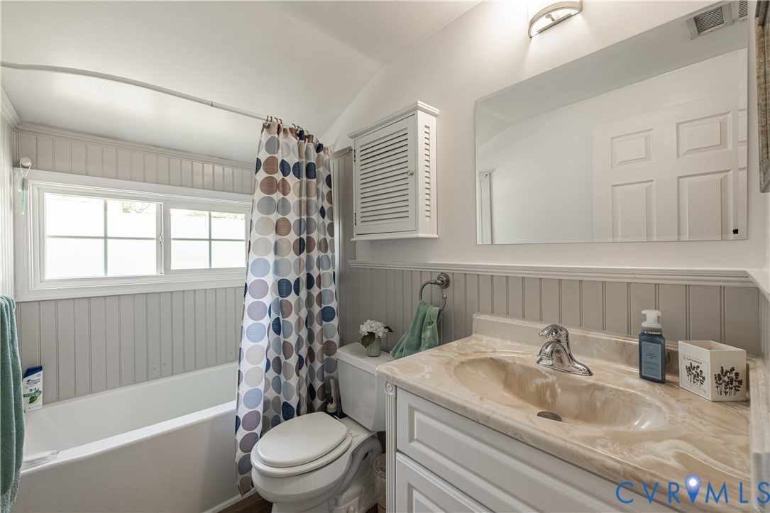 9217 Fisk Road Richmond, VA 23229 - Photo 24 of 39 a bathroom with a sink toilet bathtub and vanity