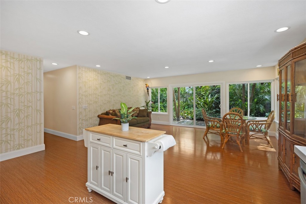 11596 Lakia Drive Cypress, CA 90630 - Photo 15 of 46 a view of living room with furniture and floor to ceiling window