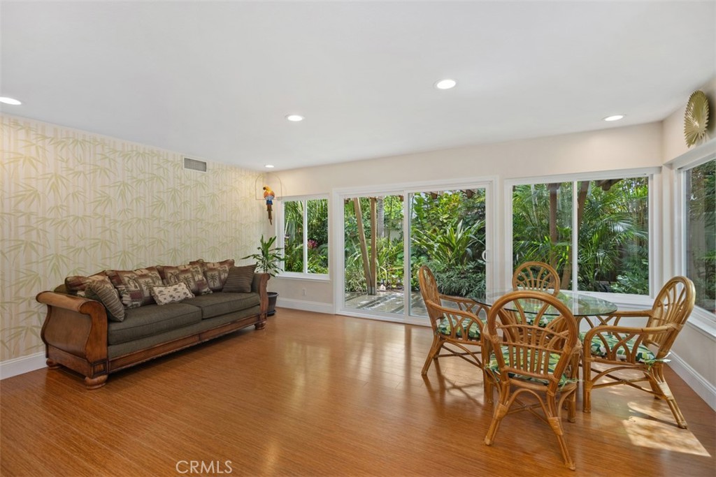 11596 Lakia Drive Cypress, CA 90630 - Photo 17 of 46 a living room with furniture and a large window