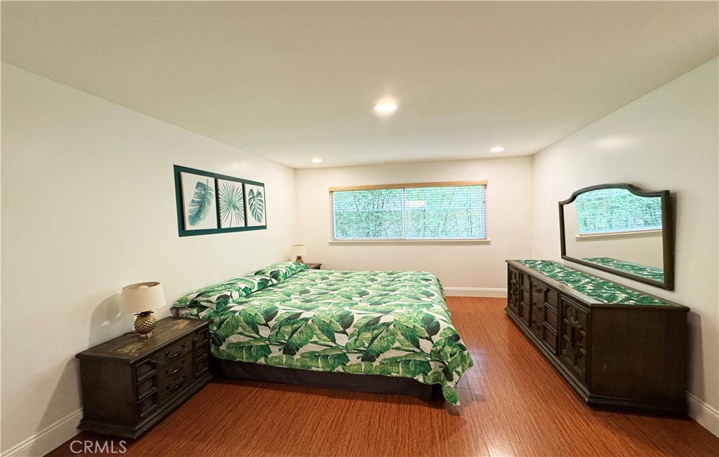 11596 Lakia Drive Cypress, CA 90630 - Photo 30 of 46 a bed room with a bed window and a dresser