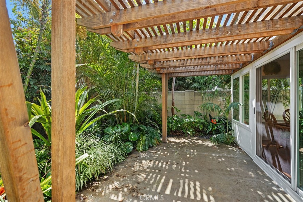 11596 Lakia Drive Cypress, CA 90630 - Photo 35 of 46 a view of a porch with a garden
