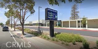 11596 Lakia Drive Cypress, CA 90630 - Photo 43 of 46 a front view of a house with garden