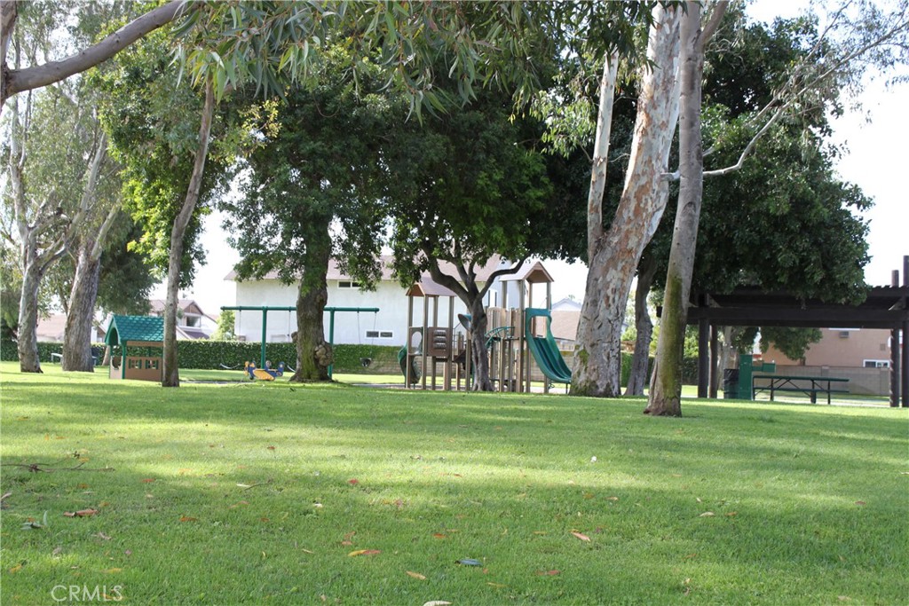 11596 Lakia Drive Cypress, CA 90630 - Photo 45 of 46 a view of a park with trees and grass