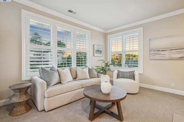 a bathroom with a sink double vanity and a mirror