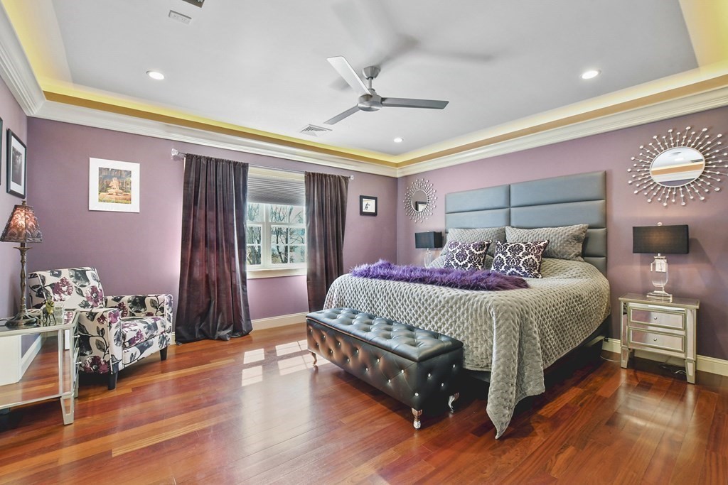 61 Court Road Braintree, MA 02184 - Photo 16 of 42 a spacious bedroom with a bed and a window