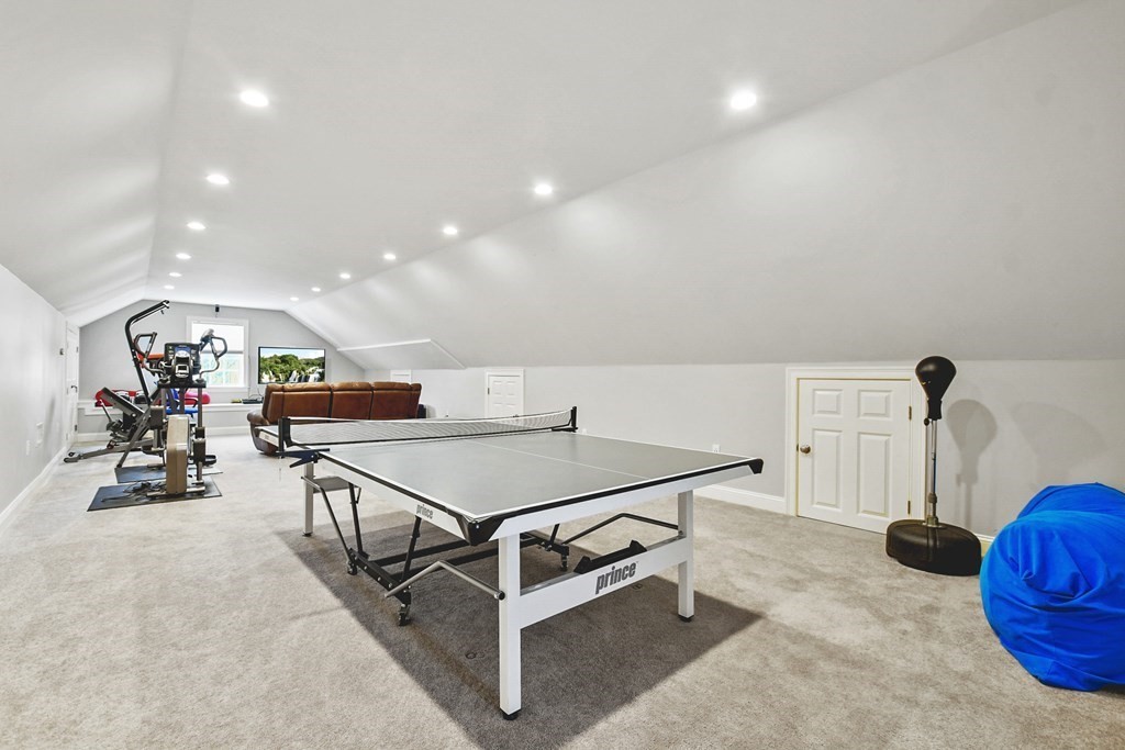 61 Court Road Braintree, MA 02184 - Photo 25 of 42 a room with table and gym equipment