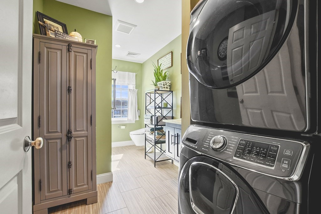 61 Court Road Braintree, MA 02184 - Photo 26 of 42 a view of a storage and utility room with a washer dryer