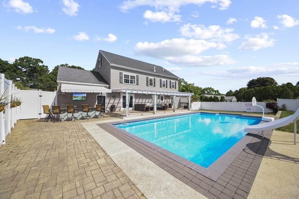 61 Court Road Braintree, MA 02184 - Photo 36 of 42 a view of a house with swimming pool and sitting area
