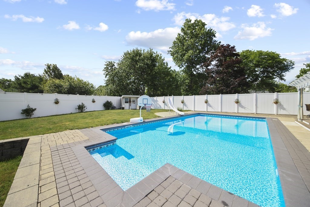 61 Court Road Braintree, MA 02184 - Photo 37 of 42 a view of a swimming pool with lawn chairs