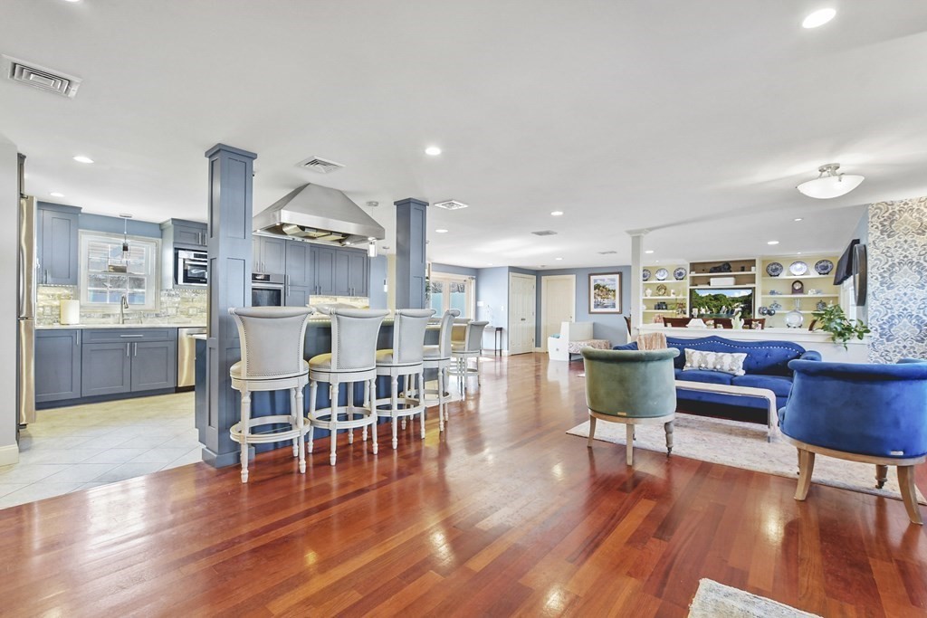 61 Court Road Braintree, MA 02184 - Photo 5 of 42 a living room with furniture wooden floor and kitchen view