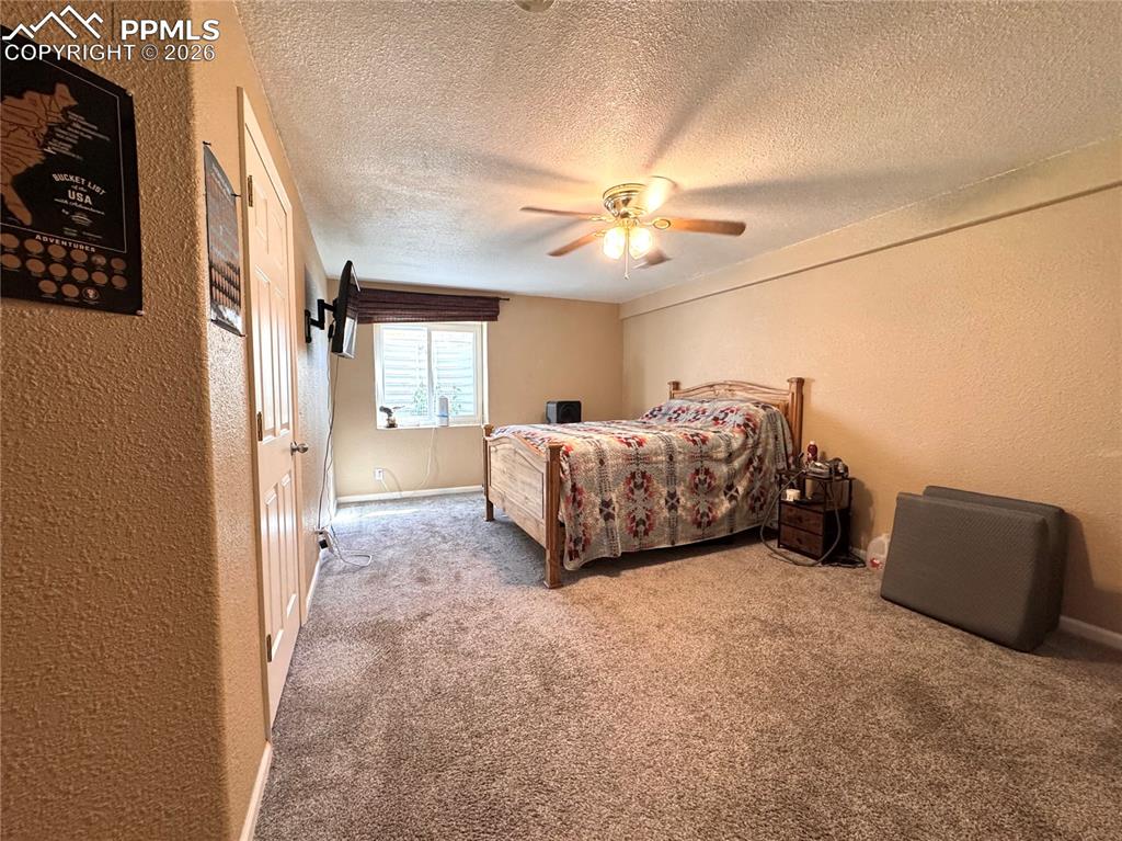 9362 St.George Road Peyton, CO 80831 - Photo 24 of 35 Basement Large Bedroom with walk in closet
