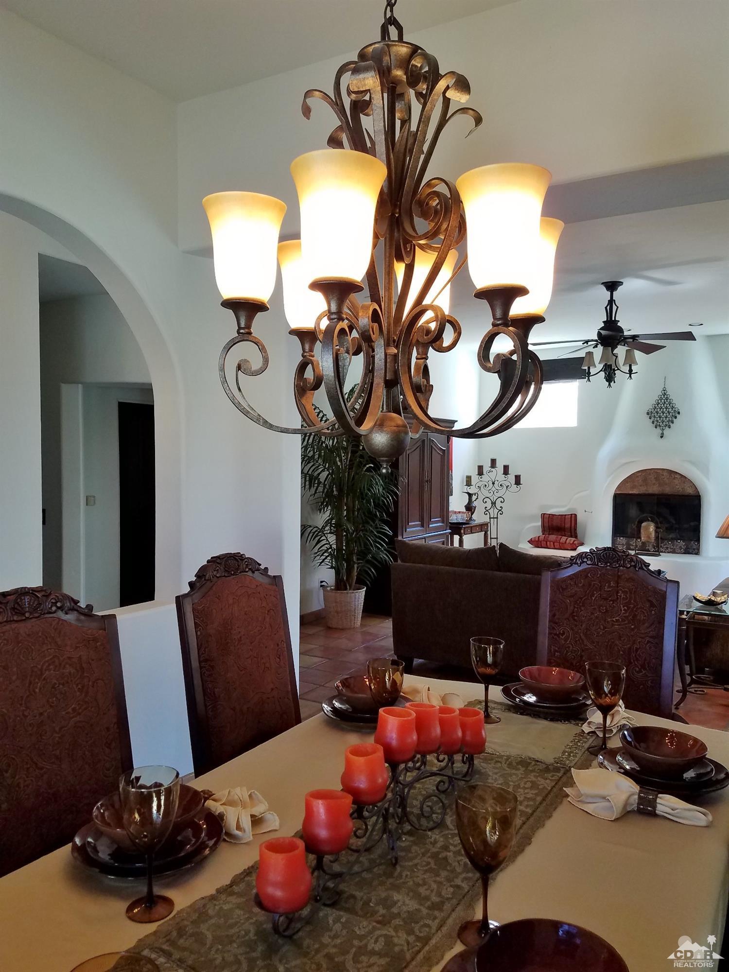 52225 Avenida Obregon La Quinta, CA 92253 - Photo 12 of 34 a room with furniture and gym equipment